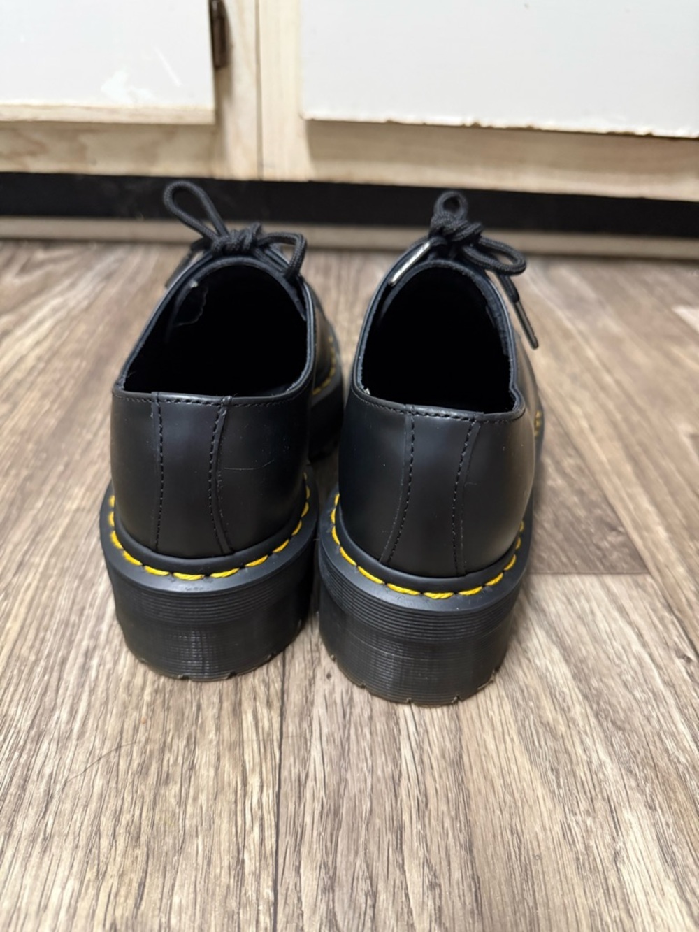 Dr. Martens Black 3-Eye Lace-Up Oxfords with Yellow Welt Stitching - Picture 4 of 6